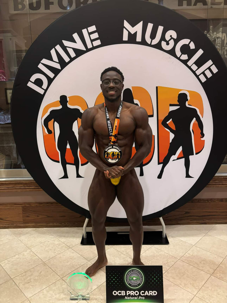Male bodybuilder earning his OCB natural pro card
